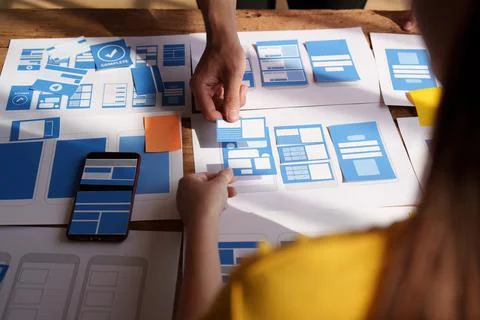 Group of ux developer and ui designer brainstorming about app interface design Foto stock