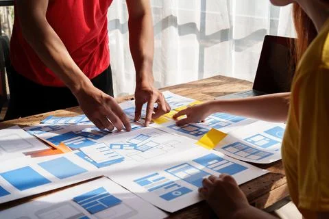 Group of ux developer and ui designer brainstorming about app interface design 写真素材