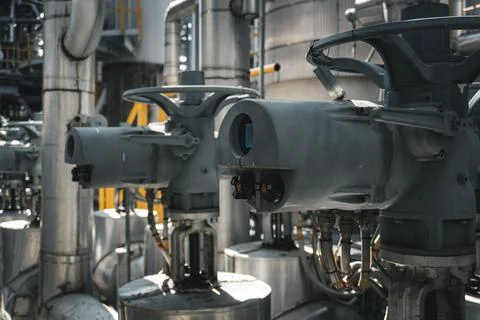 Group of valves are on a pipe Stock Photos
