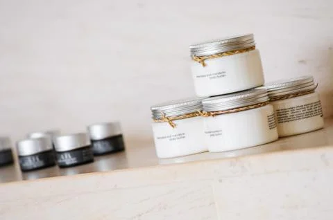 Group of variable skin care container products on  marble shelf Stock Photos