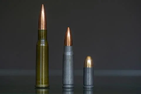 A Group of Various Military Cartridges (7.62x54r, 7.62x39, 9mm) Stock Photos