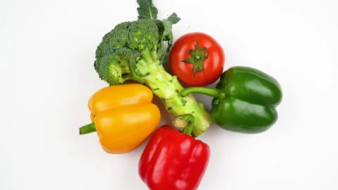 Group Vegetables Bell Peppers Broccoli Tomato Rotating White Background Stock Footage 325560174