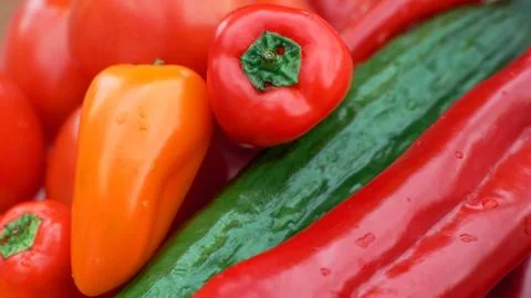 Group of vegetables close-up. Mix of vegetables. Paprika, tomatoes and cucumb Stock Photos