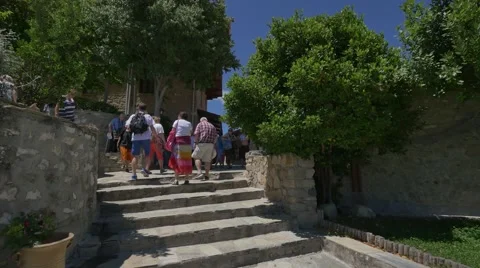 Group of visitors exploring the The Great Meteoron Monastery in Meteora, Greece Stock Footage 66546030