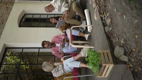 Group of volunteers planning charitable work in their community space. Stock Footage 259887866