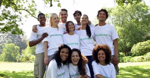 Group of volunteers smiling at the camera Stock Footage 34266335