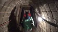 Group walking in a small salt mine tunnel HD Footage