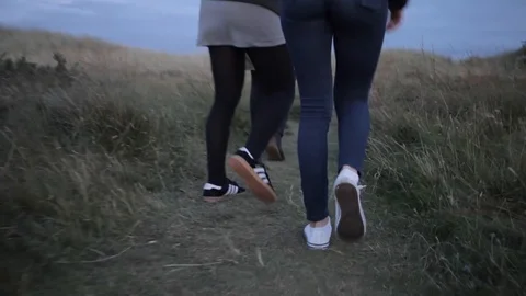 Group Walking Through Beach Grass Sand Dunes Anglesea HD Stock Footage 128043019