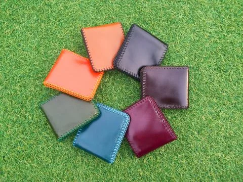 Group Wallets on grass Stock Photos