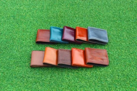 Group wallets on grass Stock Photos