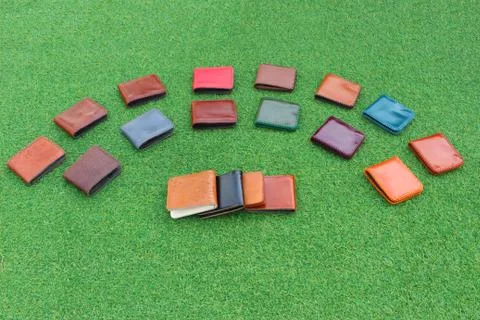 Group wallets on grass Foto stock