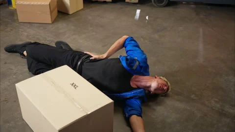 A group of warehouse workers were involved in an accident while on duty Stock Footage 308951063