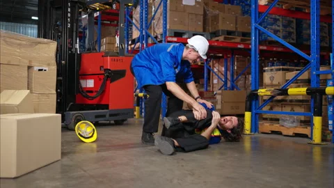 A group of warehouse workers were involved in an accident while on duty Stock Footage 308958781