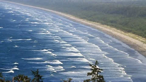 Group of waves coming ashore on beach Stock Footage 10747011