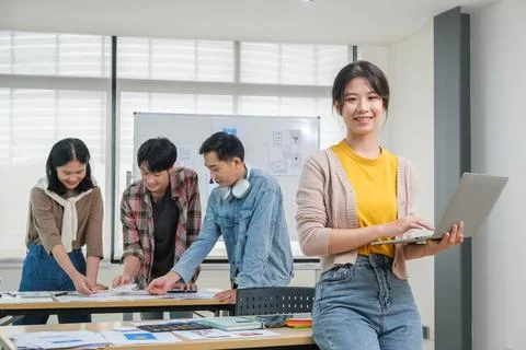 Group of web designers are working together to develop mobile responsive we.. Foto stock