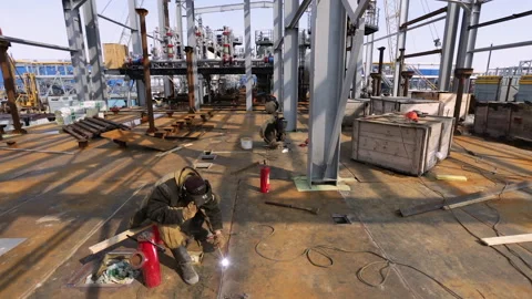 A group of welders is working at a construction site. Stock Footage 159509006