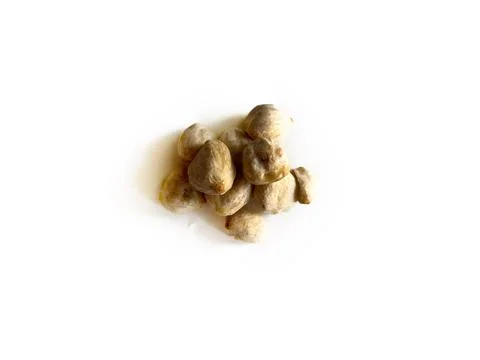 A group of whole raw candlenuts Stock Photos