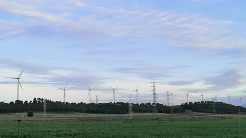 Group of wind generators, a wind farm, wind turbines with rotating blades Stock Footage 238767477