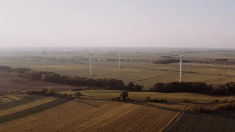 Group of wind turbines behind a forest. Stock Footage 149112254