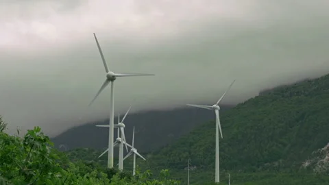 Group of wind turbines on a cloudy day. Abruzzo, Italy, Europe Stock Footage 153862485