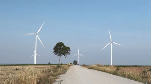 A group of Wind Turbines in a field Stock Footage 36513139
