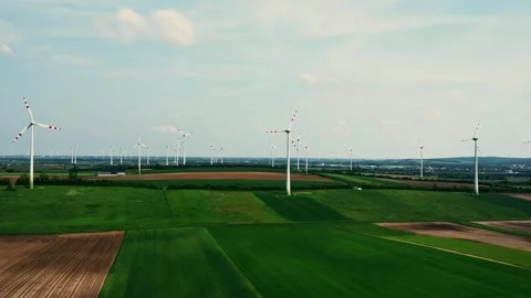 Group of wind turbines on wind farm mountain field, drone aerial view. Stock Footage 243203346