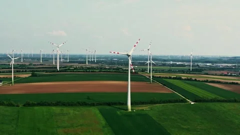 Group of wind turbines on wind farm mountain field, drone aerial view. Stock Footage 243203605