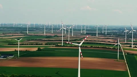 Group of wind turbines on wind farm mountain field, drone aerial view. Stock Footage 243203829