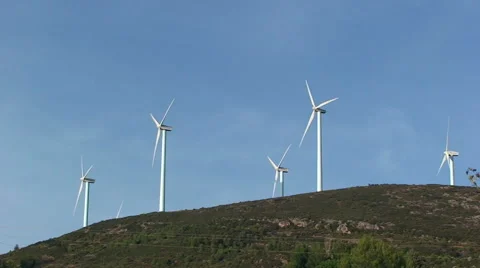 Group of windmills on a hill Stock Footage 50084787