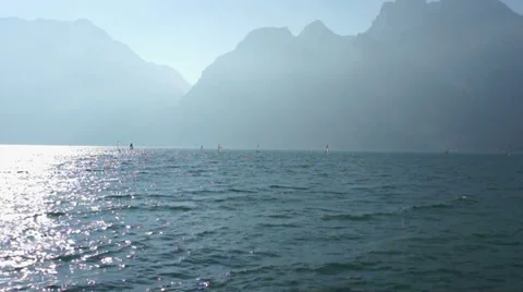 Group of windsurfers on strong wind and waves, Lake Garda, Italy HD Stock Footage 32261470