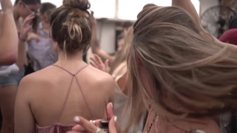 Group of women dancing, drinking and enjoying the party on a sunny day Stock Footage 139468513