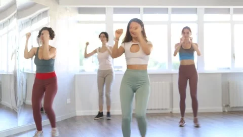Group of women dancing modern dance in studio Stock Footage 344774019