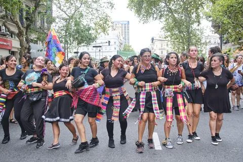 Group of women dancing while marching during the 8M women strike in Argentina Stock Photos