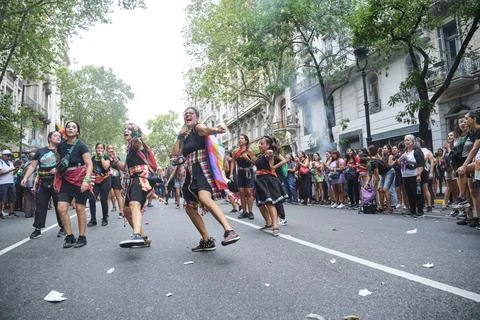 Group of women dancing while marching during the 8M women strike in Argentina Stock Photos