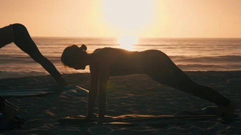 Group Of Women Practicing Yoga Stock-Footage 77585286