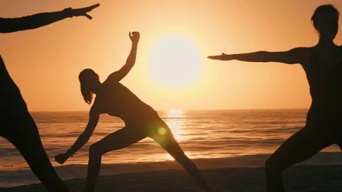 Group Of Women Practicing Yoga Stock Footage 77585455