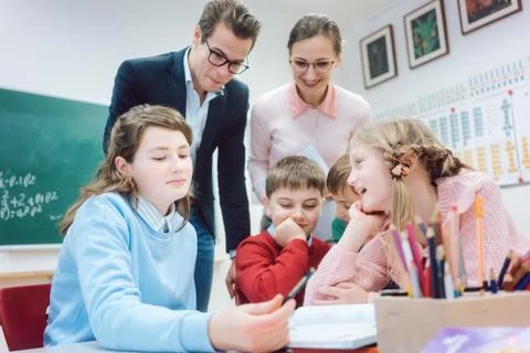 Group work session in school with teachers and pupils Stock Photos