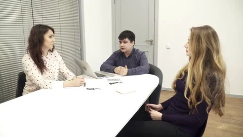 Group of workers are having a meeting in the office Stock Footage 73990501