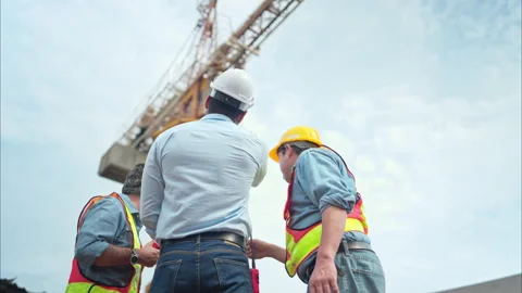 Group of workers at construction site are discussing construction progress Stock Footage 291845466