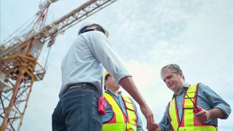 Group of workers at construction site are discussing construction progress Stock Footage 291847294