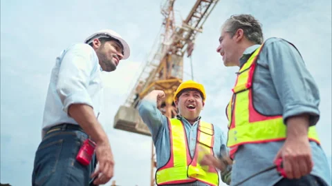 Group of workers at construction site are discussing construction progress Video stock 291851867