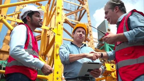 Group of workers at construction site are discussing construction progress Stock Footage 291918716