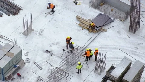 Group of workers discussing problems at the construction site Stock Footage 236473516