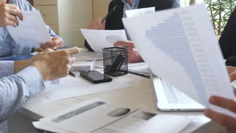 Group of workers sitting at table in office and working efficiently Video stock 152645463