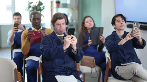 Group of workers take picture with mobile phone or photograph QR code on Video stock 330416056
