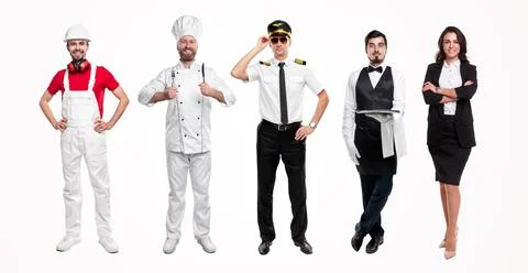 Group of workers in uniforms standing in studio Stock Photos