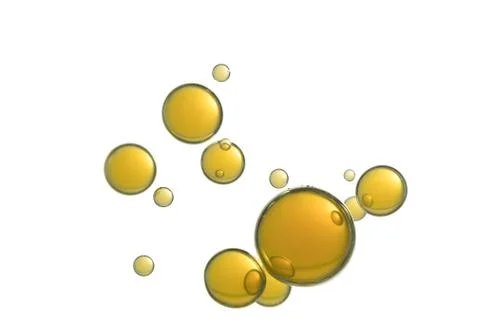 A group of yellow air bubbles soars over a white background Stock Photos