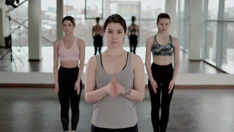 Group yoga lesson in studio Stock Footage 124289414