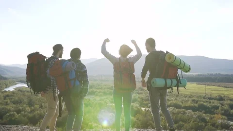Group young Active Successful People Raising Hands On Mountain Top. Hikers with Stock Footage 103292029