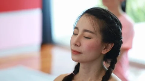 Group of young and senior attractive practicing yoga on studio class room. Stock Footage 102945615